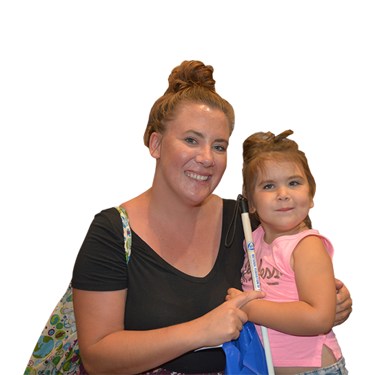 A mother and her blind daughter smile together