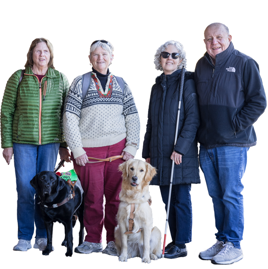 Four NFB members smile together.